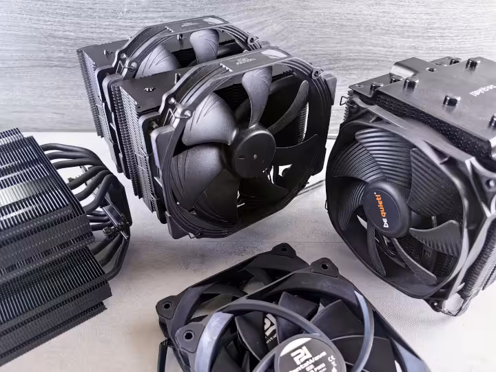 Aftermarket tower-style air CPU coolers with heat pipes and fan